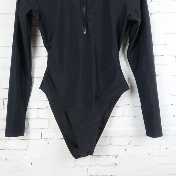 FOREVER 21 BLACK LONG SLEEVE ZIP UP BODYSUIT WITH BACK CUT OUT SIZE MEDIUM NWOT - Picture 5 of 7